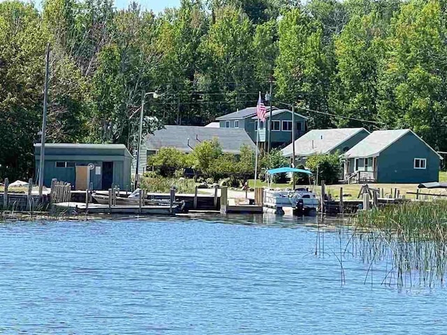 view of water feature with a boat dock