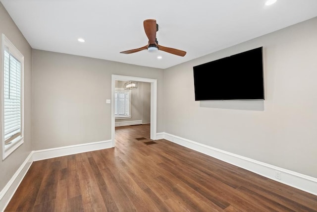 unfurnished room with visible vents, baseboards, ceiling fan, wood finished floors, and recessed lighting