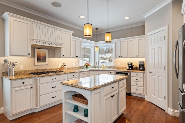 2632 Woodside Dr, Petoskey, MI 49770 - kitchen with stainless steel appliances, white cabinetry, a kitchen island, and open shelves
