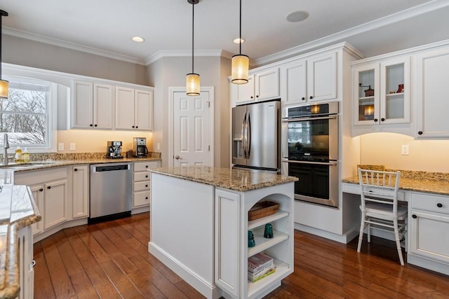 2632 Woodside Dr, Petoskey, MI 49770 - kitchen with white cabinets, open shelves, stainless steel appliances, and decorative light fixtures