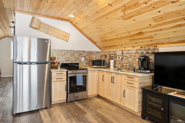 kitchen featuring stainless steel appliances, light stone counters, wooden ceiling, and a sink