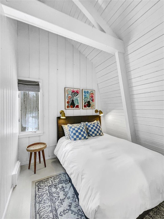 bedroom with vaulted ceiling with beams and wooden ceiling