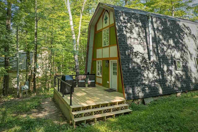 view of outbuilding featuring an outdoor hangout area