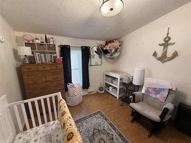 bedroom with visible vents and a textured ceiling