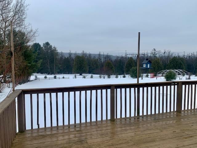 view of snow covered deck