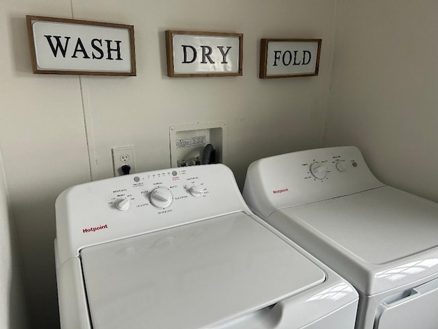 laundry area featuring laundry area and washing machine and clothes dryer