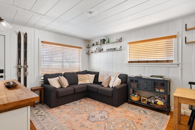 living room featuring wooden ceiling and wood finished floors