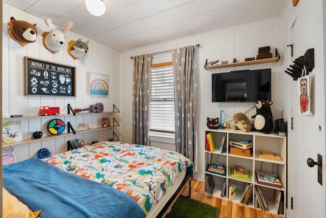 bedroom featuring wood finished floors