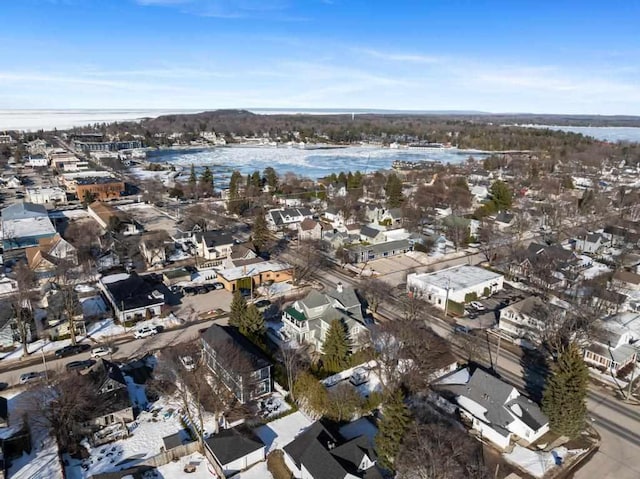 bird's eye view with a water view and a residential view