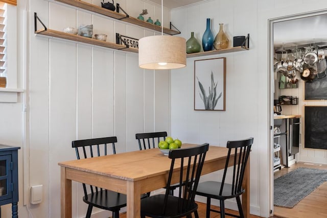 dining room with wood finished floors