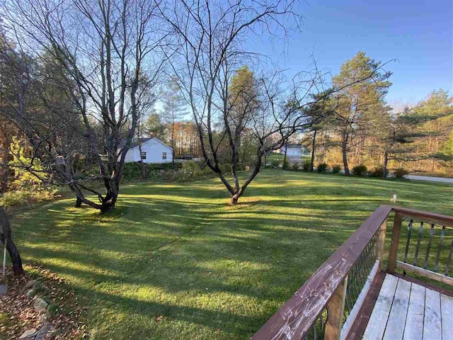 view of yard featuring a deck