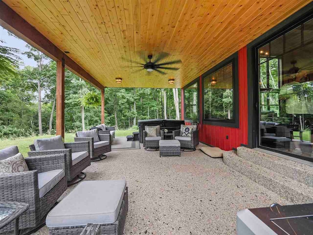 view of patio featuring an outdoor hangout area and ceiling fan