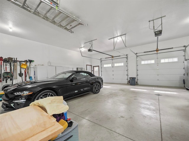 garage featuring a garage door opener