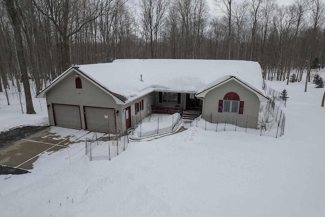 6617 Nightingale Dr, Gaylord, MI 49735 - view of front of property featuring an attached garage