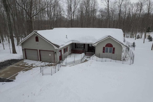 view of front of property featuring an attached garage