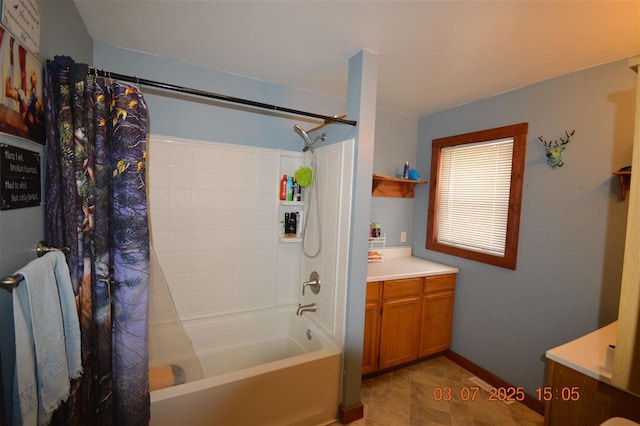 full bathroom featuring baseboards, vanity, and shower / tub combo with curtain