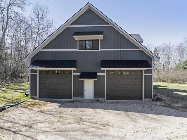 view of front of home with metal roof and a standing seam roof