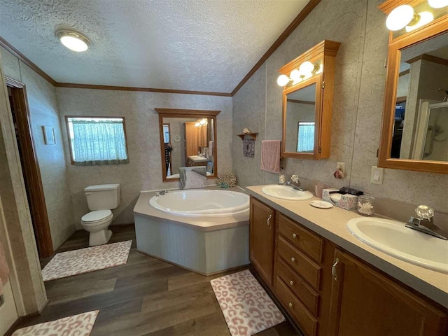 full bath featuring a sink, wood finished floors, and ornamental molding