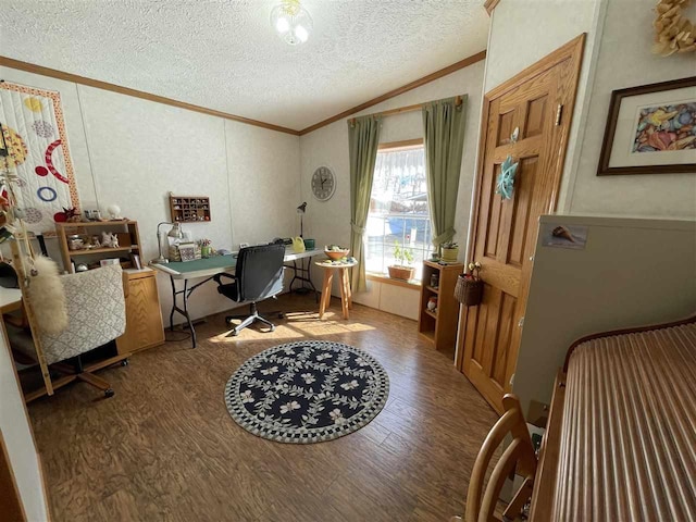 home office with a textured ceiling, wood finished floors, crown molding, and vaulted ceiling