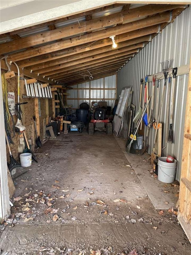 interior space featuring metal wall