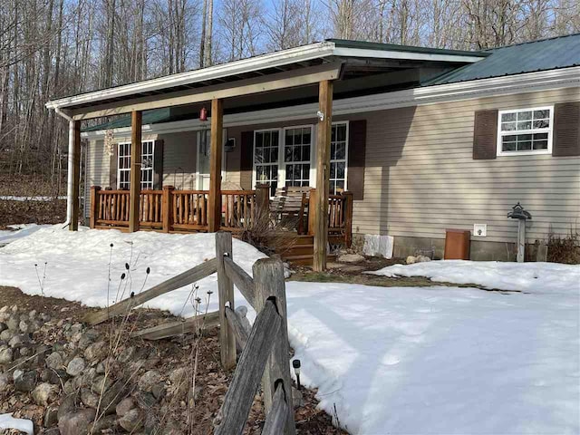 view of front of home with metal roof