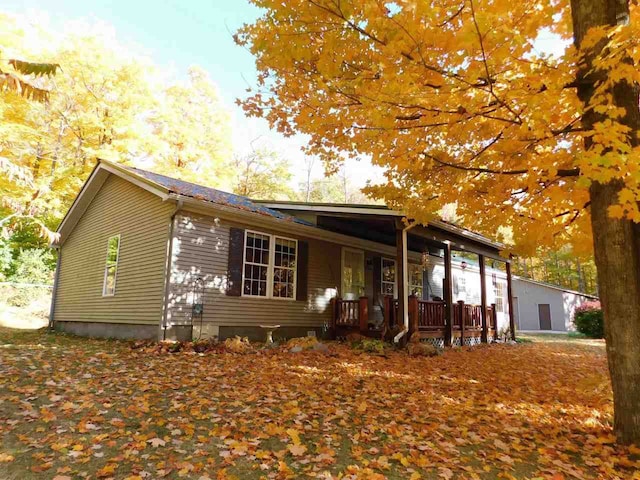 ranch-style house featuring a porch