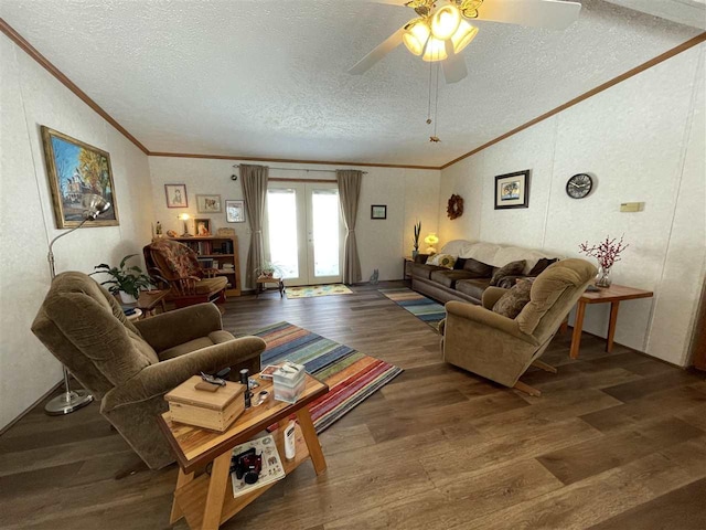 living room featuring french doors, a textured ceiling, wood finished floors, and crown molding