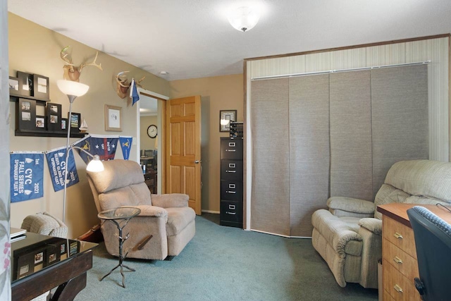 living area with carpet flooring