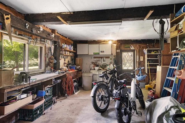 interior space featuring a workshop area and unfinished concrete floors