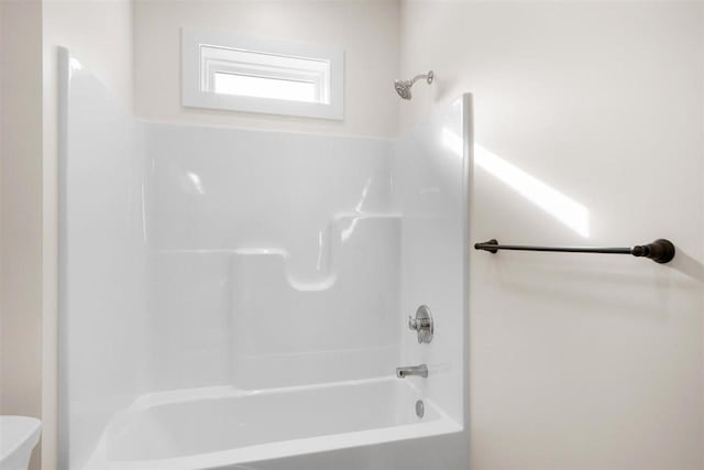 full bath with shower / washtub combination and toilet