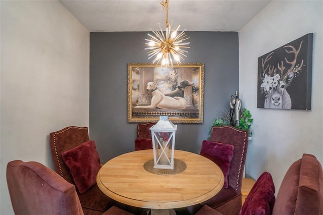 dining room featuring a notable chandelier