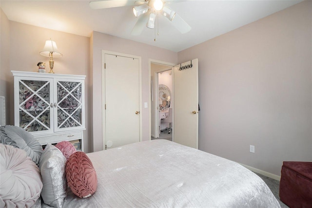 bedroom featuring ceiling fan, baseboards, and carpet floors