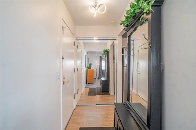 hall featuring light wood-style flooring