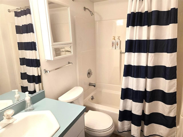 bathroom with toilet, vanity, and shower / bath combination with curtain