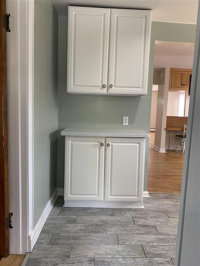 room details with wood finished floors and baseboards