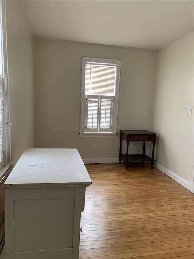 interior space with light wood-type flooring and baseboards