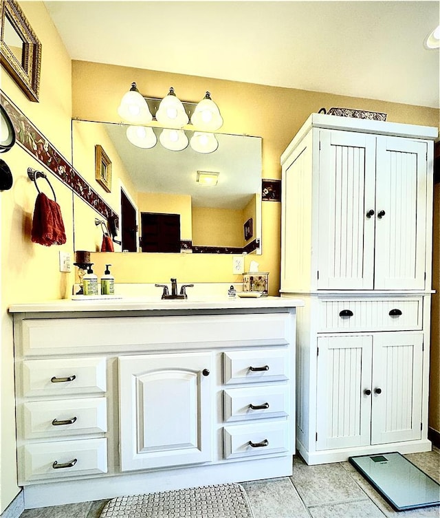 bathroom with vanity and tile patterned floors