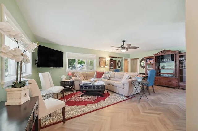 living area featuring ceiling fan