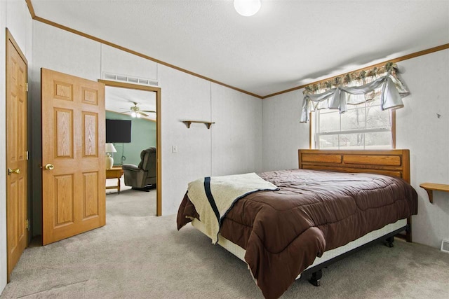 7116 S M-88 Hwy, Bellaire, MI 49615 - bedroom with light carpet, lofted ceiling, crown molding, and visible vents