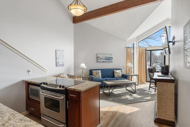 kitchen featuring beamed ceiling, wood finished floors, light stone countertops, high vaulted ceiling, and stainless steel appliances