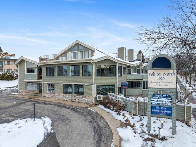 view of snow covered property