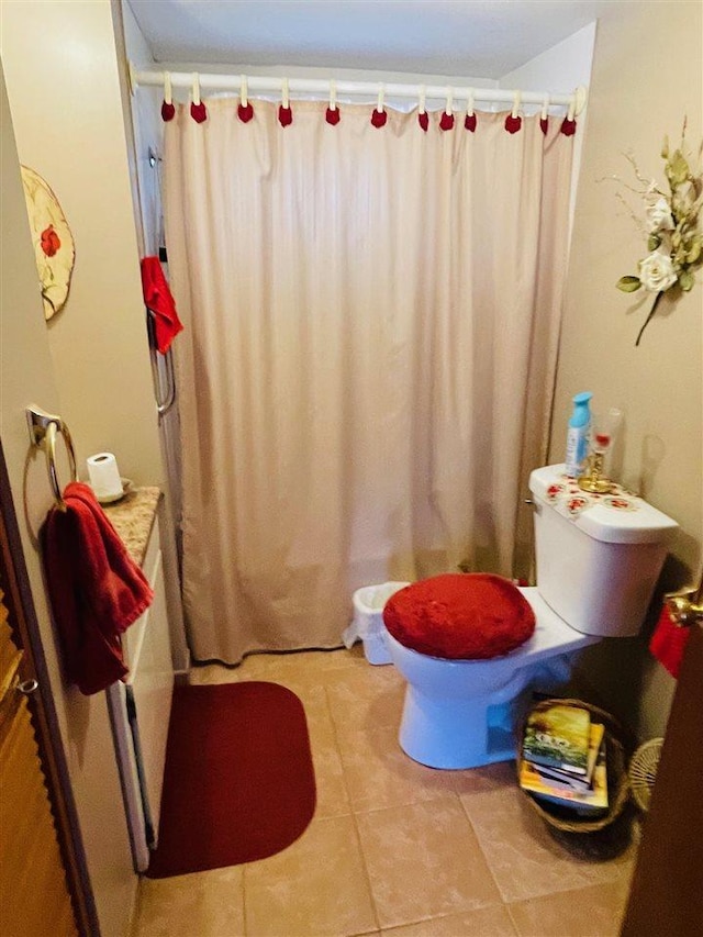 4635 Mohrmann Rd, Central Lake, MI 49622 - bathroom with a shower with shower curtain and tile patterned flooring