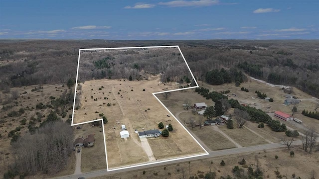 9196 NW Manley Rd, Alden, MI 49612 - bird's eye view featuring a view of trees and a rural view