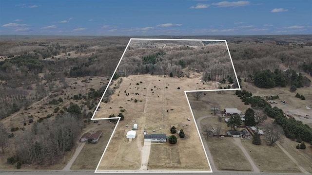 9196 NW Manley Rd, Alden, MI 49612 - birds eye view of property featuring a rural view and a wooded view