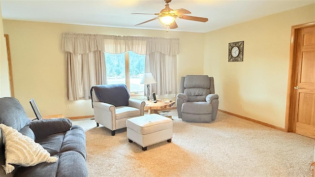 9196 NW Manley Rd, Alden, MI 49612 - sitting room with carpet floors, ceiling fan, and baseboards