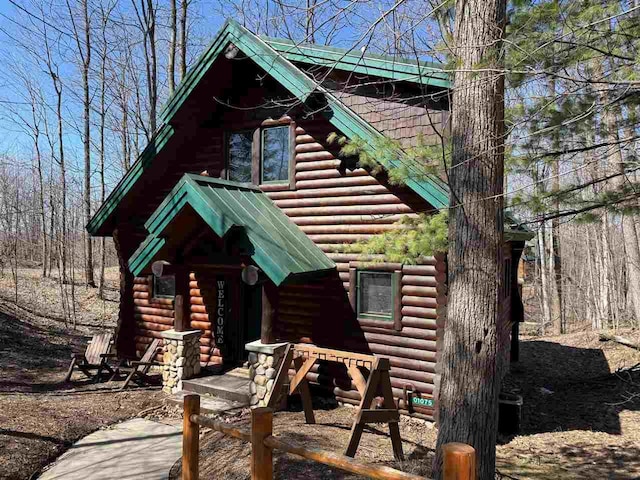 exterior space featuring log exterior