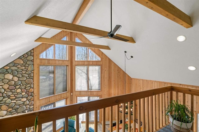 interior details with beamed ceiling and ceiling fan