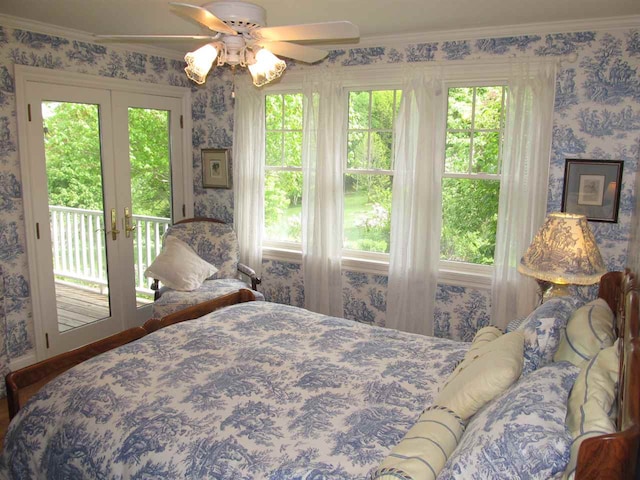 4251 Terpening Rd, Harbor Springs, MI 49740 - bedroom with crown molding, wallpapered walls, ceiling fan, french doors, and access to outside