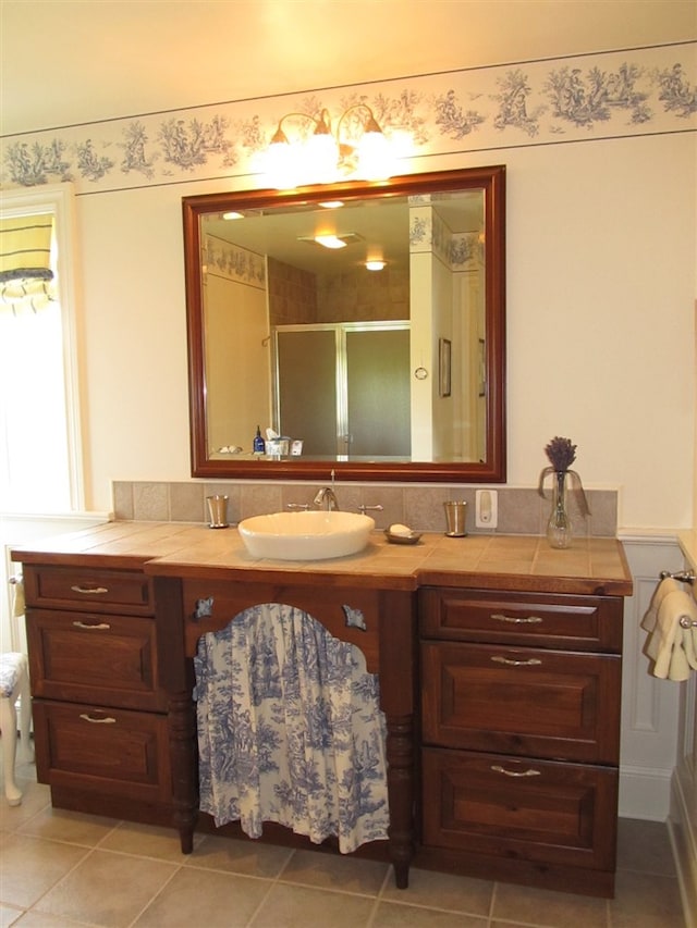 4251 Terpening Rd, Harbor Springs, MI 49740 - bathroom with a shower stall, tile patterned flooring, and vanity