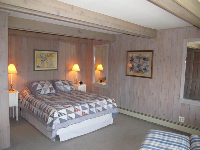 4251 Terpening Rd, Harbor Springs, MI 49740 - bedroom with a baseboard radiator, wood walls, beamed ceiling, and carpet